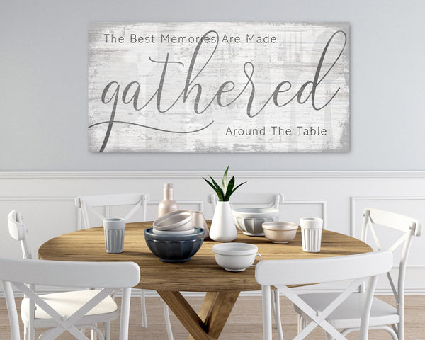 Farmhouse-style quote white wood sign hanging on a wall above a kitchen table
