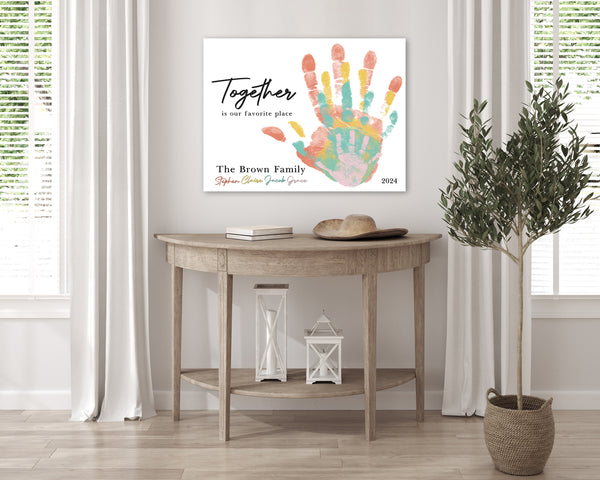 White Family Handprint Canvas on Wall in family room