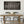 Farmhouse-style quote sign hanging on a wall above a dining table