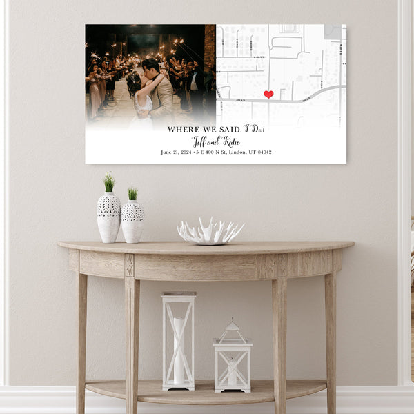 A "Where We Said I Do" canvas hanging on a wall in the hallway.  
