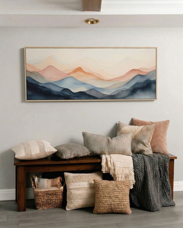 Living room with a wooden bench, pillows, and a large abstract painting on the wall.