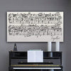 A personalized sheet music canvas with song title. Includes customization of color, font, and song. 