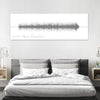 This is a personalized sound wave created by either choice of song or voice recording. Also includes a title, names, or a wedding date. 
